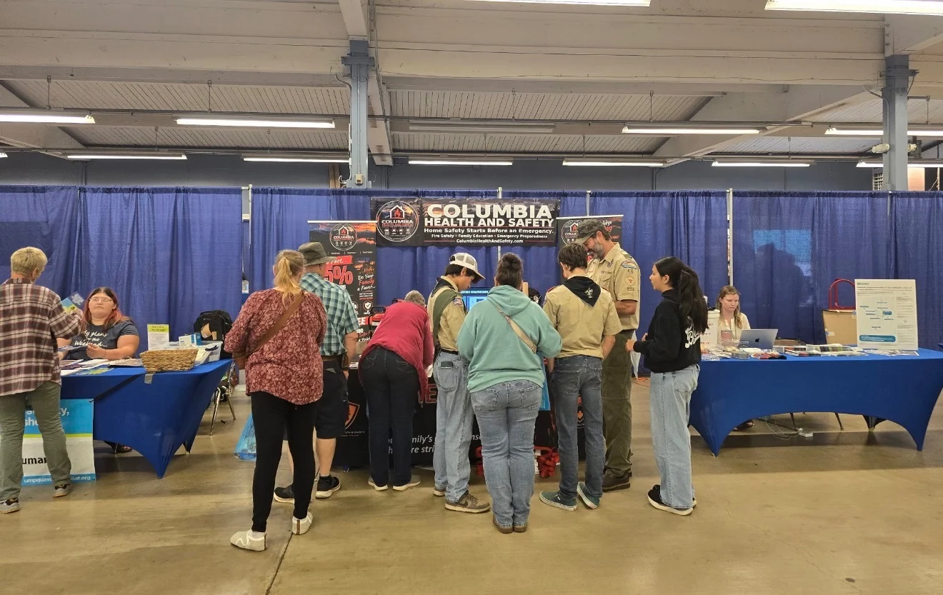 Community & Events Scouts and community visitors at the Columbia Health & Safety booth during the Emergency Preparedness Show in Roseburg, Oregon, September 2026.